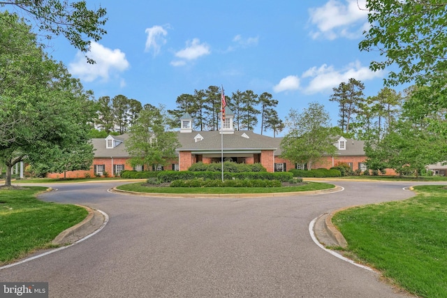 11587 Wollaston Cir, Swan Point, MD 20645 - view of front of house featuring brick siding
