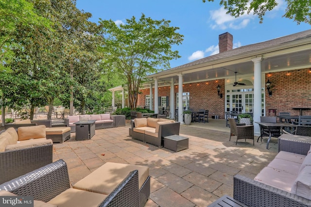 11587 Wollaston Cir, Swan Point, MD 20645 - view of patio / terrace with an outdoor living space, outdoor dining area, and a ceiling fan