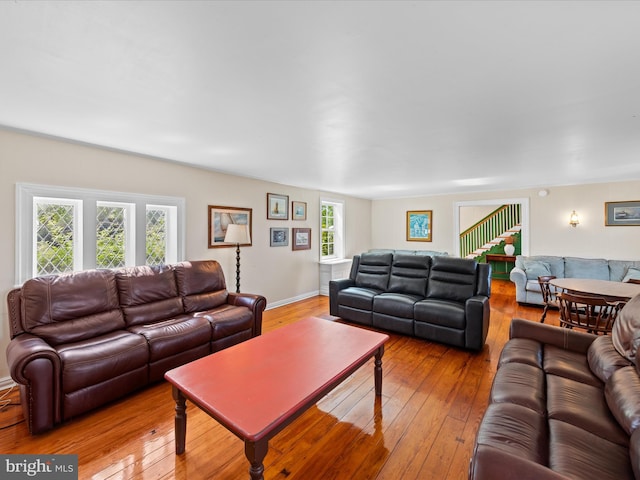 5917 Horns Point Rd, Cambridge, MD 21613 - living room with hardwood / wood-style floors, stairway, and baseboards