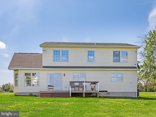 5917 Horns Point Rd, Cambridge, MD 21613 - back of property with a lawn and a wooden deck