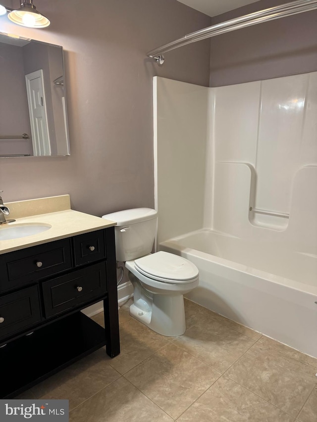 961 Rue Madora, Bear, DE 19701 - bathroom with washtub / shower combination, vanity, toilet, and tile patterned flooring
