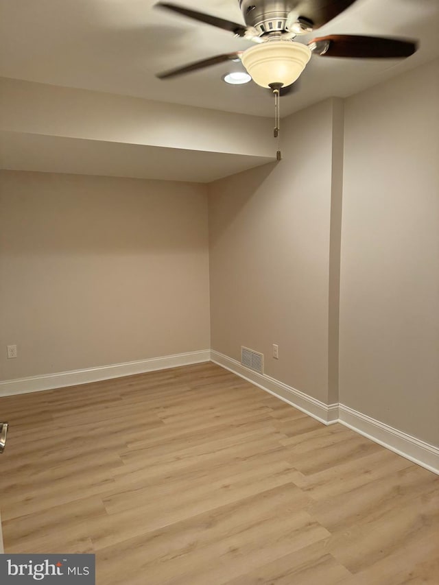 961 Rue Madora, Bear, DE 19701 - spare room featuring light wood-style floors, ceiling fan, baseboards, and visible vents