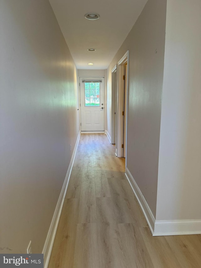 961 Rue Madora, Bear, DE 19701 - hallway featuring baseboards and light wood-type flooring