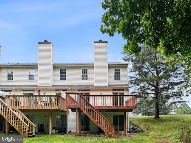 998 Glackens Ln, Wilmington, DE 19808 - rear view of property featuring stairs, a deck, and a yard