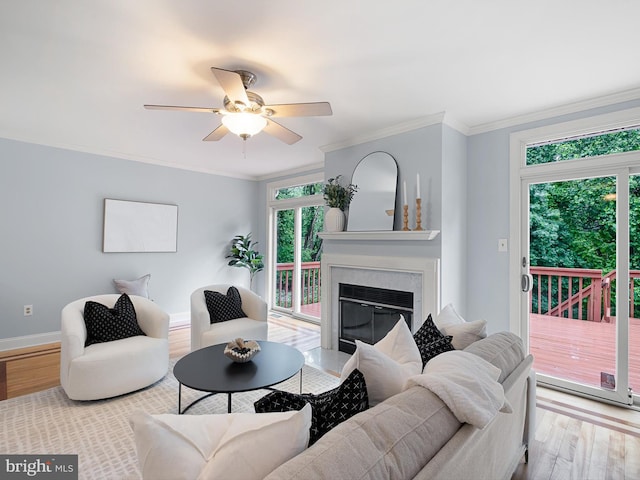 998 Glackens Ln, Wilmington, DE 19808 - living room with plenty of natural light, wood finished floors, a ceiling fan, baseboards, and crown molding