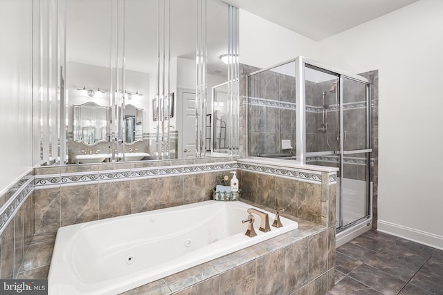 full bath with baseboards, a shower stall, marble finish floor, and a jetted tub