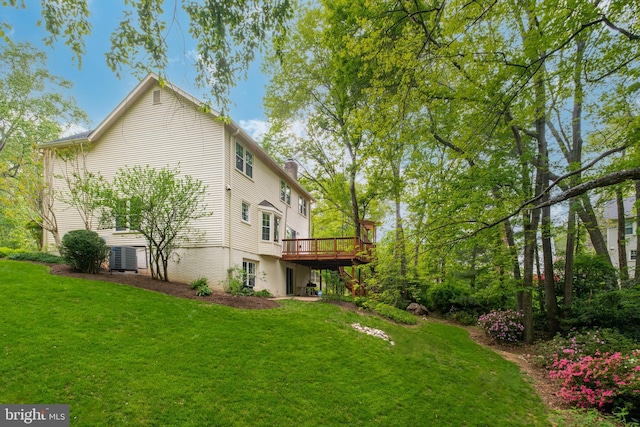 view of yard with stairway and a deck