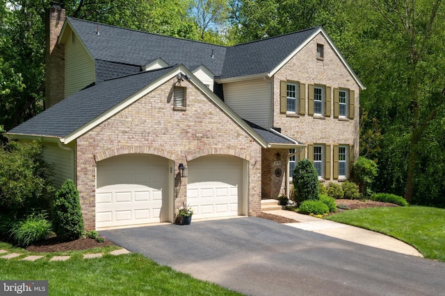 10702 Dundas Oak Ct, Burke, VA 22015 - view of front of home with a chimney, driveway, a shingled roof, and a garage