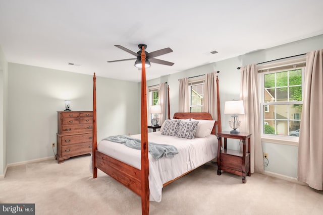 10702 Dundas Oak Ct, Burke, VA 22015 - bedroom with light carpet, baseboards, and visible vents