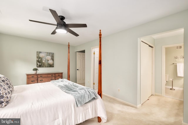 10702 Dundas Oak Ct, Burke, VA 22015 - bedroom with baseboards, ceiling fan, visible vents, connected bathroom, and light colored carpet
