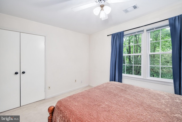 10702 Dundas Oak Ct, Burke, VA 22015 - carpeted bedroom featuring baseboards, a ceiling fan, and visible vents
