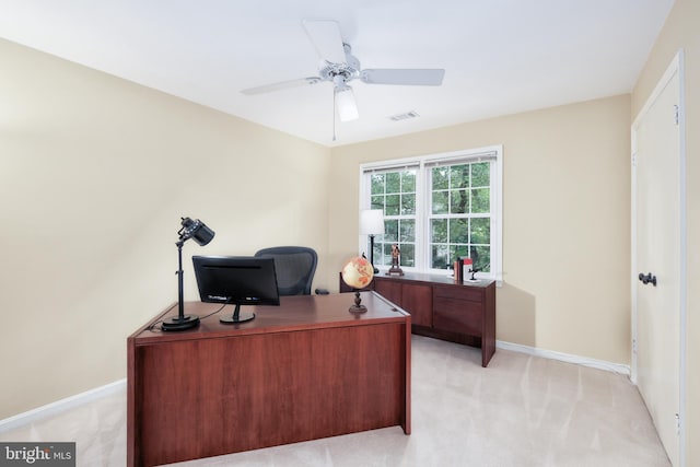 10702 Dundas Oak Ct, Burke, VA 22015 - home office featuring light colored carpet, visible vents, baseboards, and a ceiling fan
