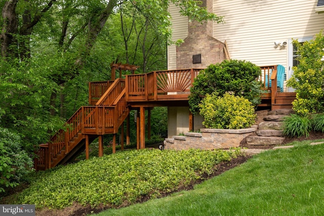view of playground featuring a deck and stairs