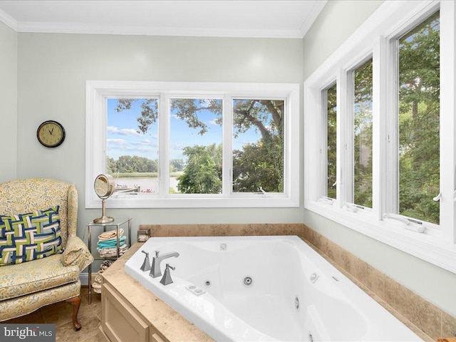 full bathroom featuring a whirlpool tub, tile patterned floors, and crown molding