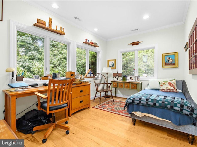 bedroom featuring crown molding, wood finished floors, and recessed lighting