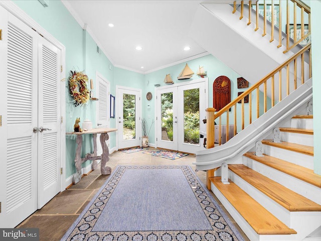 foyer featuring baseboards, recessed lighting, stairway, french doors, and crown molding