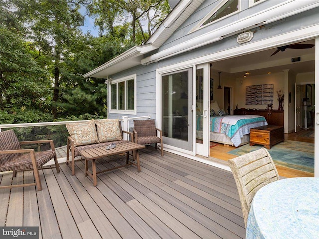 wooden deck featuring an outdoor living space