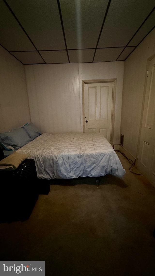 bedroom featuring a drop ceiling