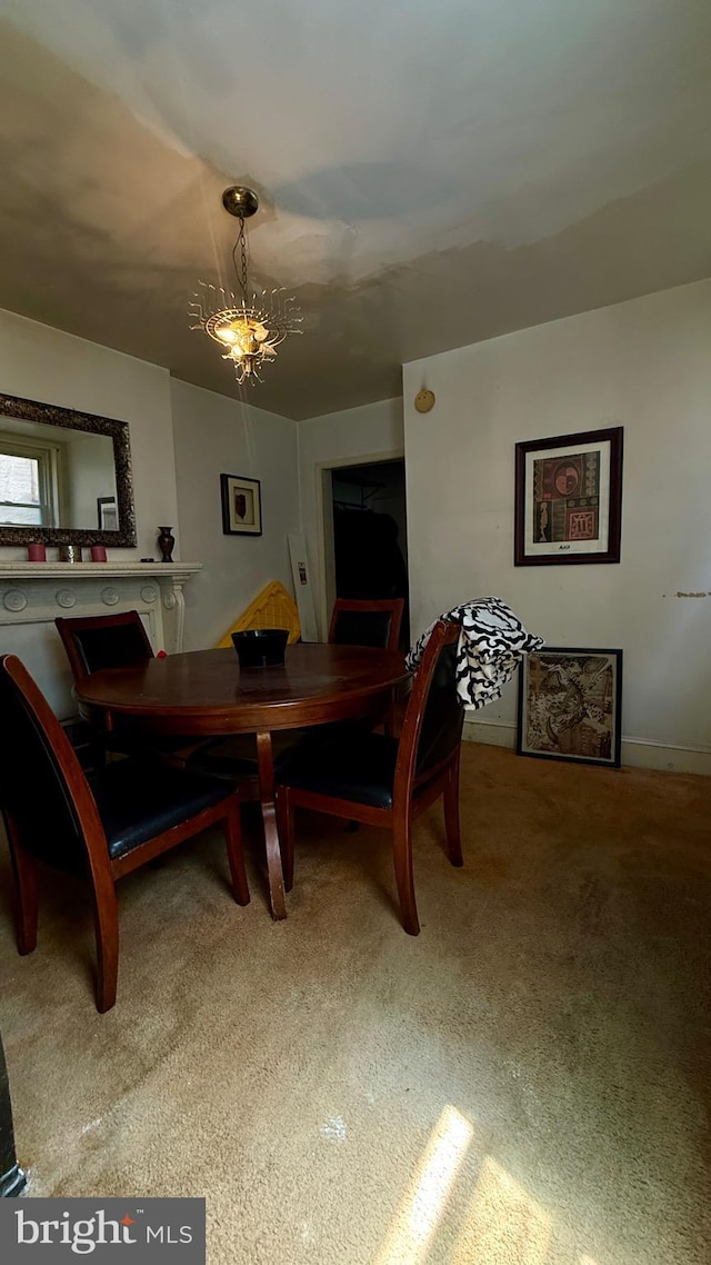 view of carpeted dining space