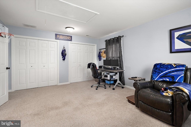 office area with attic access, carpet floors, visible vents, and baseboards