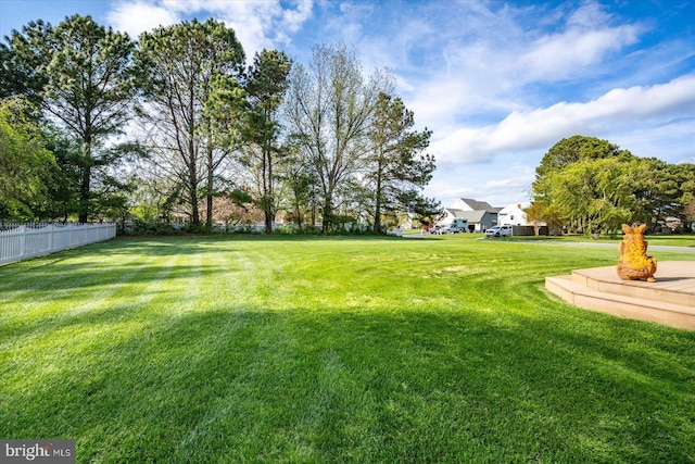 view of yard featuring fence