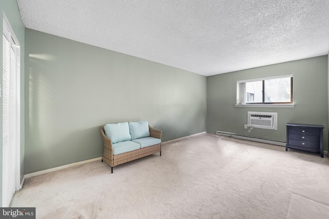 400 Glendale Rd Unit H-30, Havertown, PA 19083 - living area featuring a baseboard radiator, a textured ceiling, an AC wall unit, and carpet floors