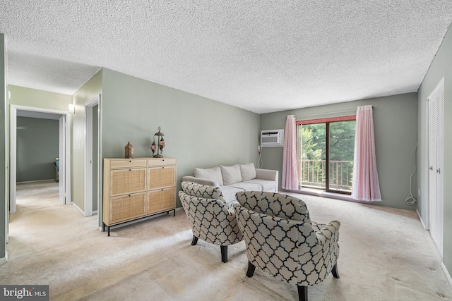 400 Glendale Rd Unit H-30, Havertown, PA 19083 - living area with carpet, a wall mounted AC, and a textured ceiling
