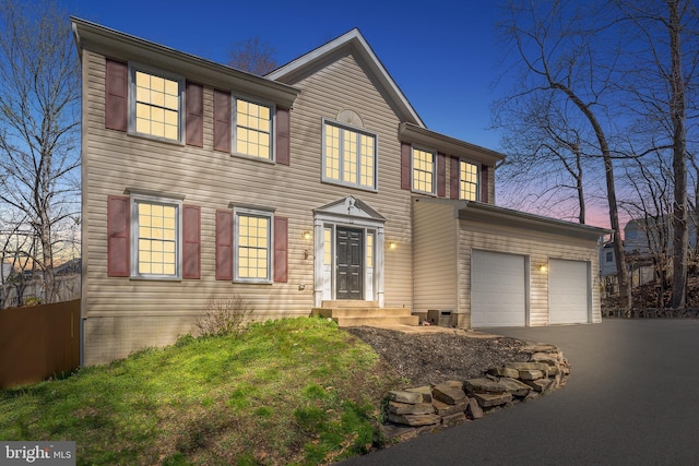 colonial home with driveway