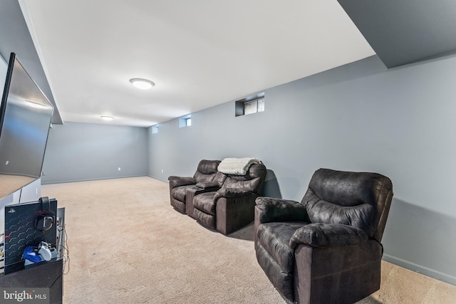 home theater with carpet and baseboards