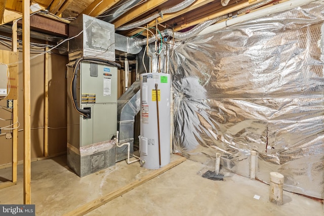 utility room with heating unit and water heater