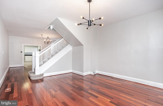 3524 Hickory Ave, Baltimore, MD 21211 - interior space with an inviting chandelier, baseboards, stairway, and wood finished floors