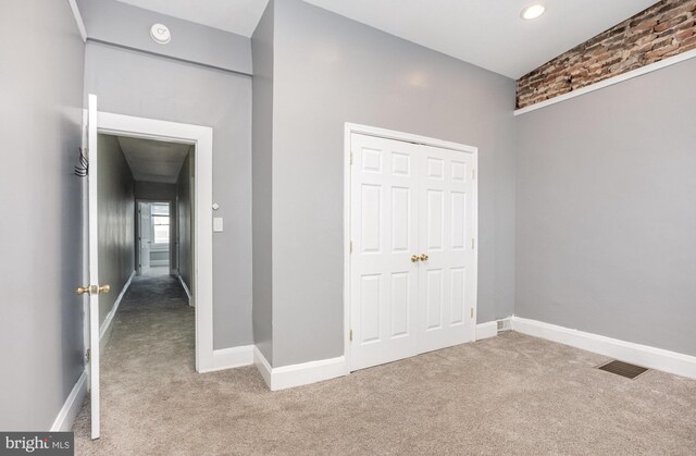 3524 Hickory Ave, Baltimore, MD 21211 - unfurnished bedroom featuring baseboards, carpet flooring, visible vents, and a closet