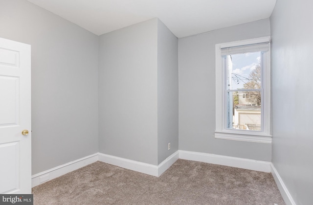 3524 Hickory Ave, Baltimore, MD 21211 - empty room with baseboards and carpet flooring