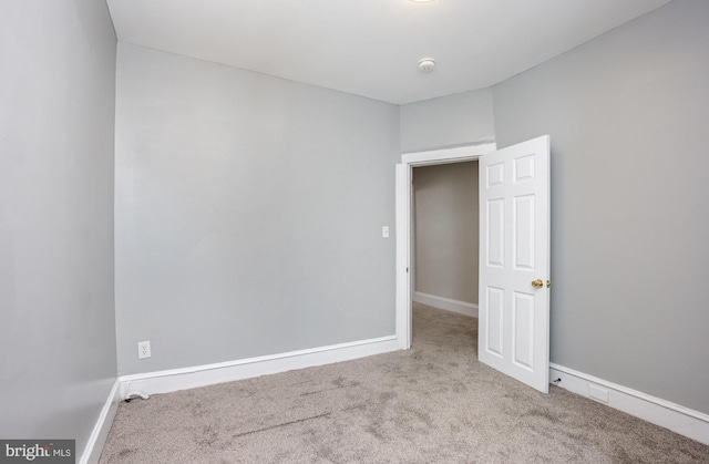 3524 Hickory Ave, Baltimore, MD 21211 - carpeted empty room with baseboards