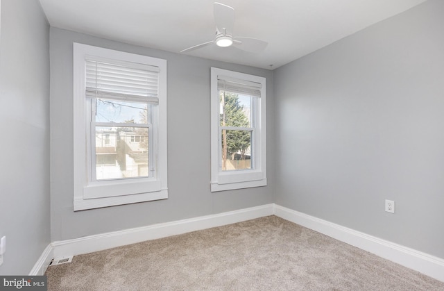 3524 Hickory Ave, Baltimore, MD 21211 - carpeted empty room featuring baseboards, visible vents, and ceiling fan
