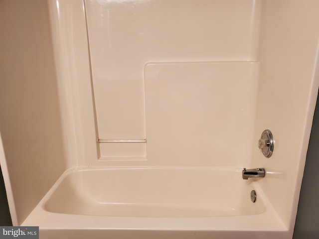 full bath featuring shower / washtub combination