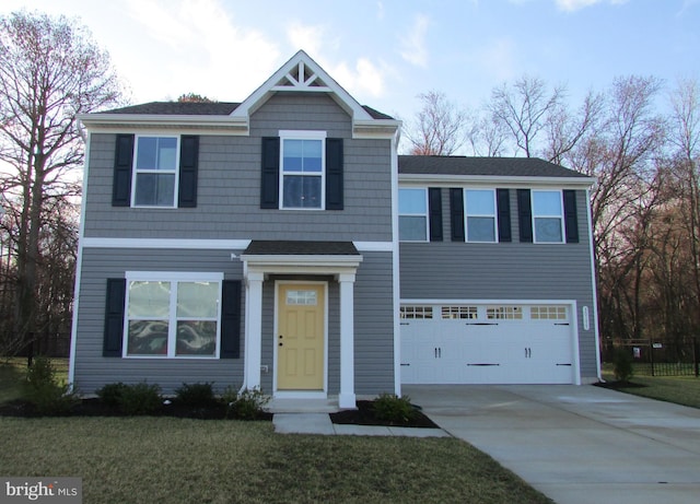 30155 Creekview Cir, Selbyville, DE 19975 - view of front of house featuring a garage, concrete driveway, and a front yard
