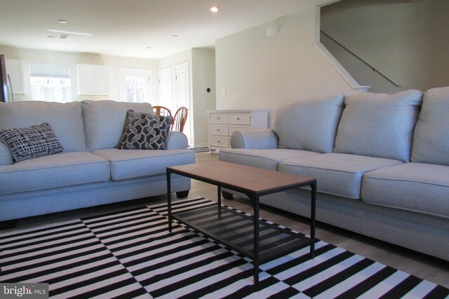 30155 Creekview Cir, Selbyville, DE 19975 - living area with recessed lighting, wood finished floors, and stairway