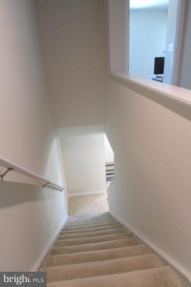 30155 Creekview Cir, Selbyville, DE 19975 - stairway featuring baseboards and wood finished floors