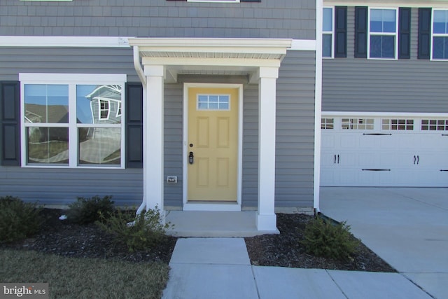 30155 Creekview Cir, Selbyville, DE 19975 - doorway to property featuring driveway and a garage