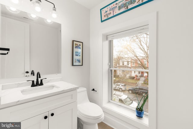 632 Rock Creek Church Rd NW Unit 2, Washington, DC 20010 - half bathroom featuring vanity and toilet