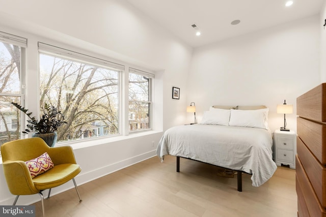 632 Rock Creek Church Rd NW Unit 2, Washington, DC 20010 - bedroom featuring multiple windows, recessed lighting, and light wood-style floors