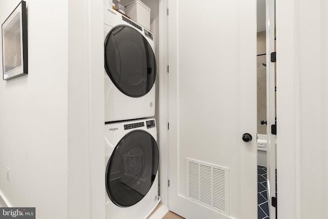 632 Rock Creek Church Rd NW Unit 2, Washington, DC 20010 - laundry room with stacked washing machine and dryer