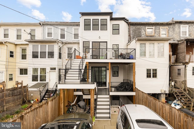 632 Rock Creek Church Rd NW Unit 2, Washington, DC 20010 - rear view of property featuring stairs and a fenced backyard