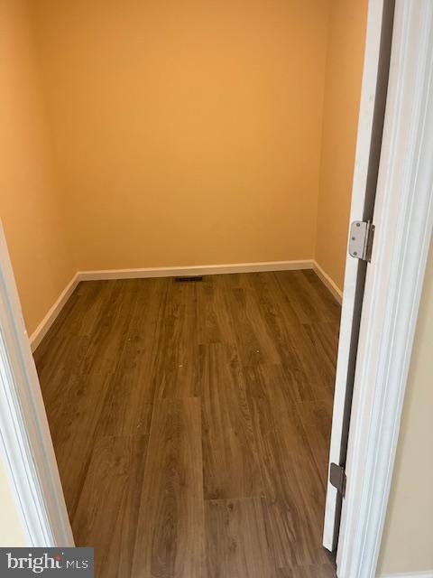 628 W 2nd St, Florence, NJ 08518 - spare room with dark wood-type flooring and baseboards
