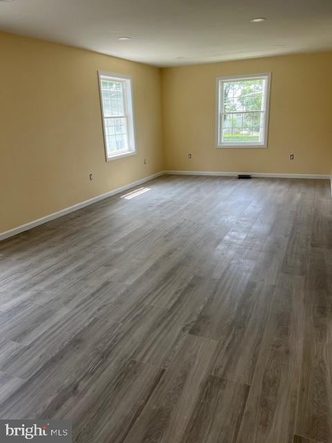 628 W 2nd St, Florence, NJ 08518 - empty room with dark wood-type flooring and baseboards