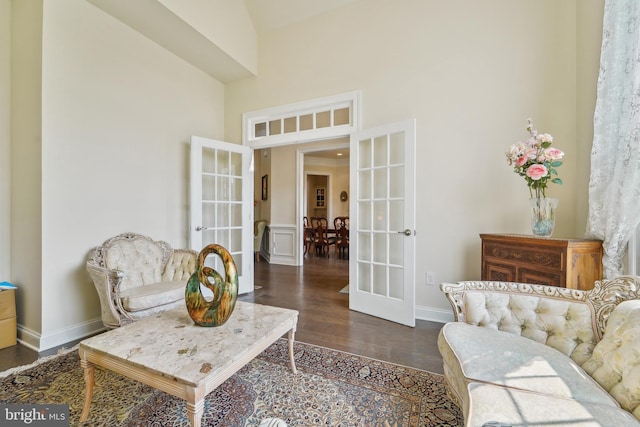 2042 Drovers Ln, Cooksville, MD 21723 - living area with french doors, wood finished floors, baseboards, and a towering ceiling