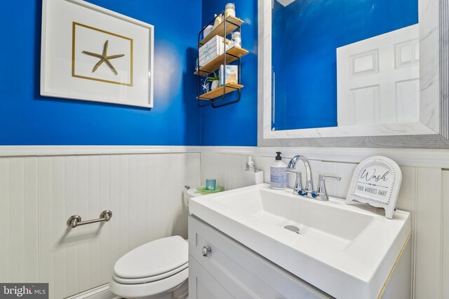 2042 Drovers Ln, Cooksville, MD 21723 - bathroom with vanity, a wainscoted wall, and toilet