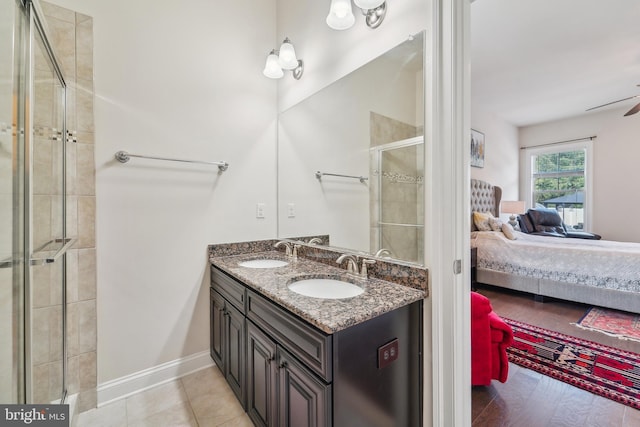 2042 Drovers Ln, Cooksville, MD 21723 - ensuite bathroom with a stall shower, double vanity, and ceiling fan
