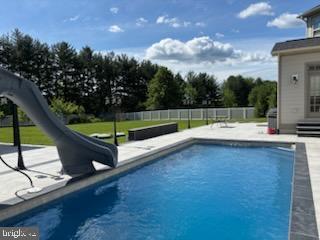 2042 Drovers Ln, Cooksville, MD 21723 - view of swimming pool featuring a patio area and a water slide